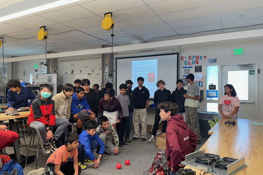 Students watching a demonstration of the competition robot